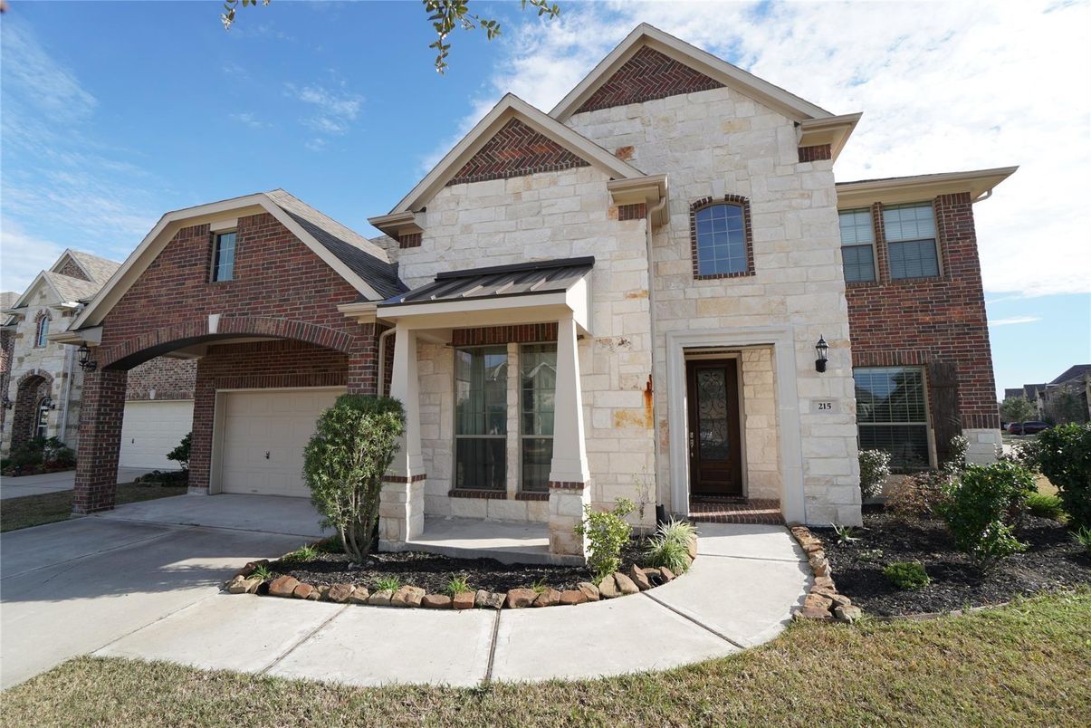 Attached, Exterior, Facade, Brick Facade, Brick Traditional