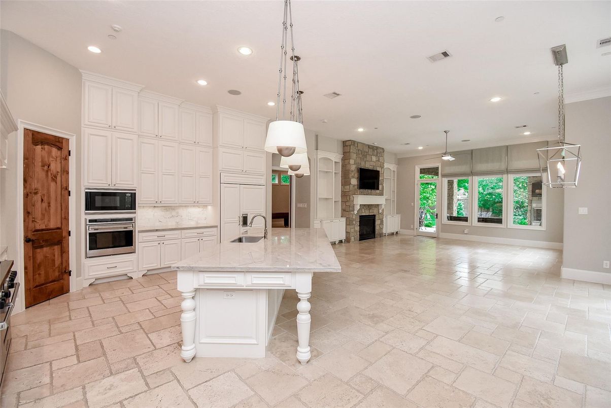 Fireplace, Interior, Kitchen, Pendant Lights, Recessed Lighting, Stainless Steel Appliances