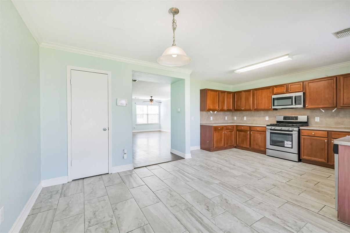 Interior, Kitchen, Marble, Pendant Lights, Stainless Steel Appliances, Wood Texture Flooring