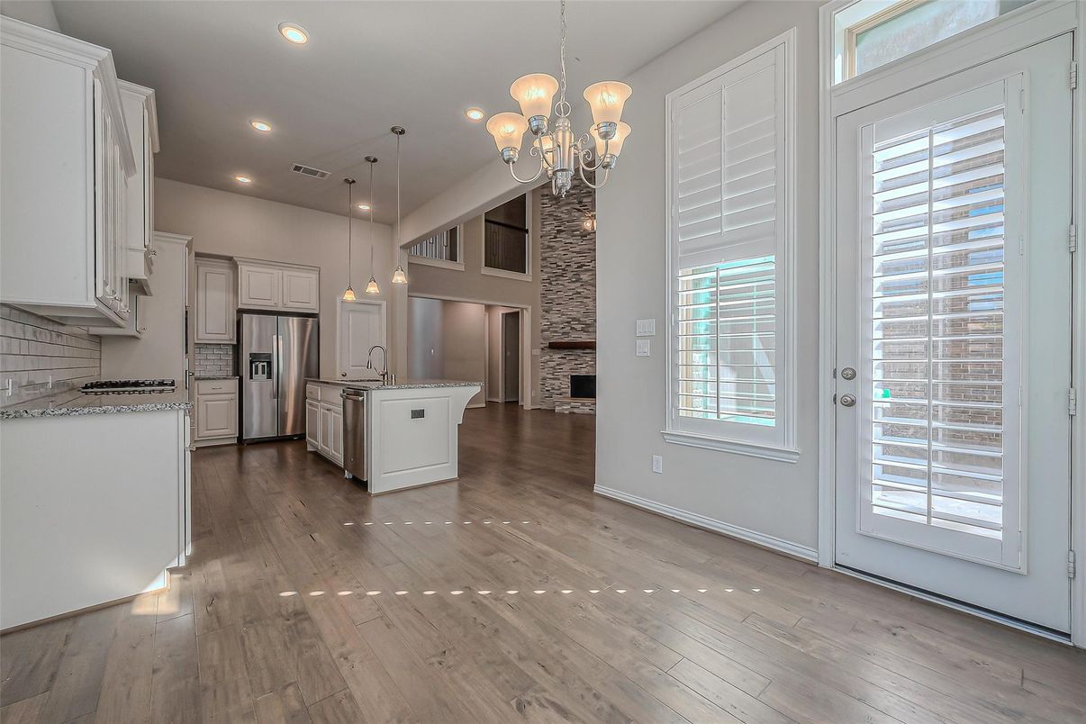 Chandelier, Interior, Kitchen, Pendant Lights, Recessed Lighting, Stainless Steel Appliances, Wood Texture Flooring