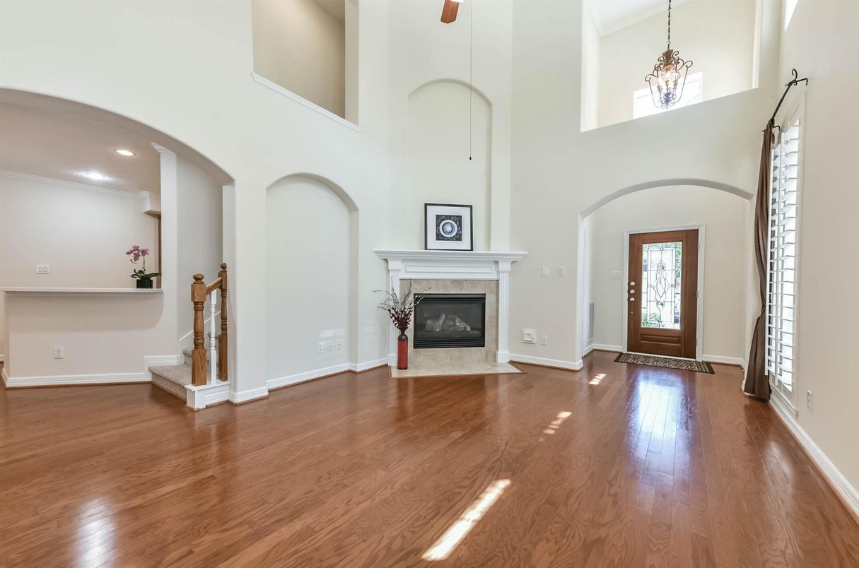 Fireplace, Interior, Pendant Lights, Recessed Lighting, Wood Texture Flooring