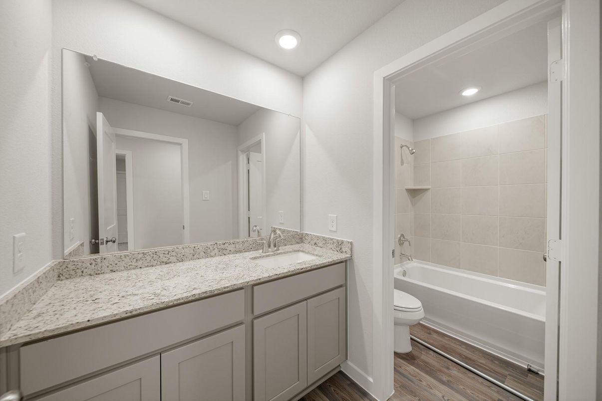 Bathroom, Dual Sink Vanities, Interior, Recessed Lighting, Wood Texture Flooring