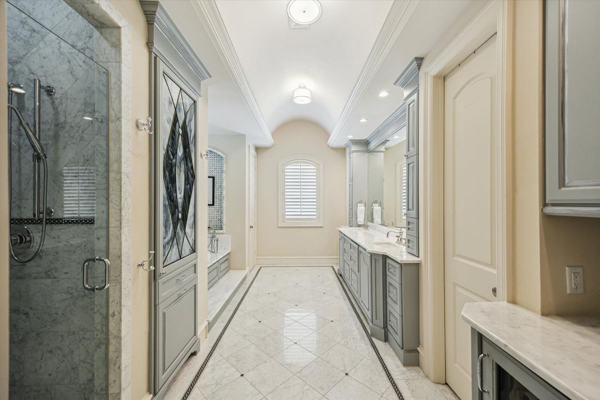Bathroom, Dual Sink Vanities, Glass Shower, Interior, Marble, Marble Walls, Recessed Lighting