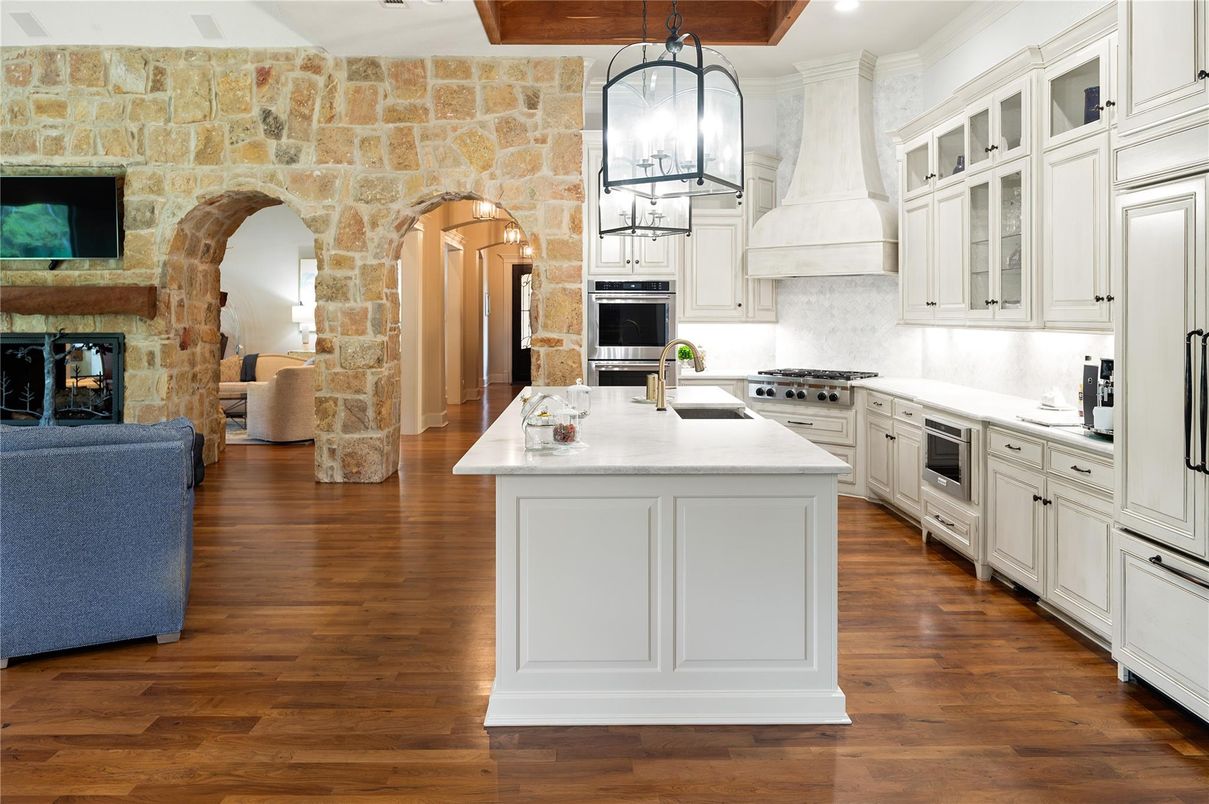 Interior, Kitchen, Pendant Lights, Recessed Lighting, Stainless Steel Appliances, Stone Walls, Wooden Beams, Wood Texture Flooring