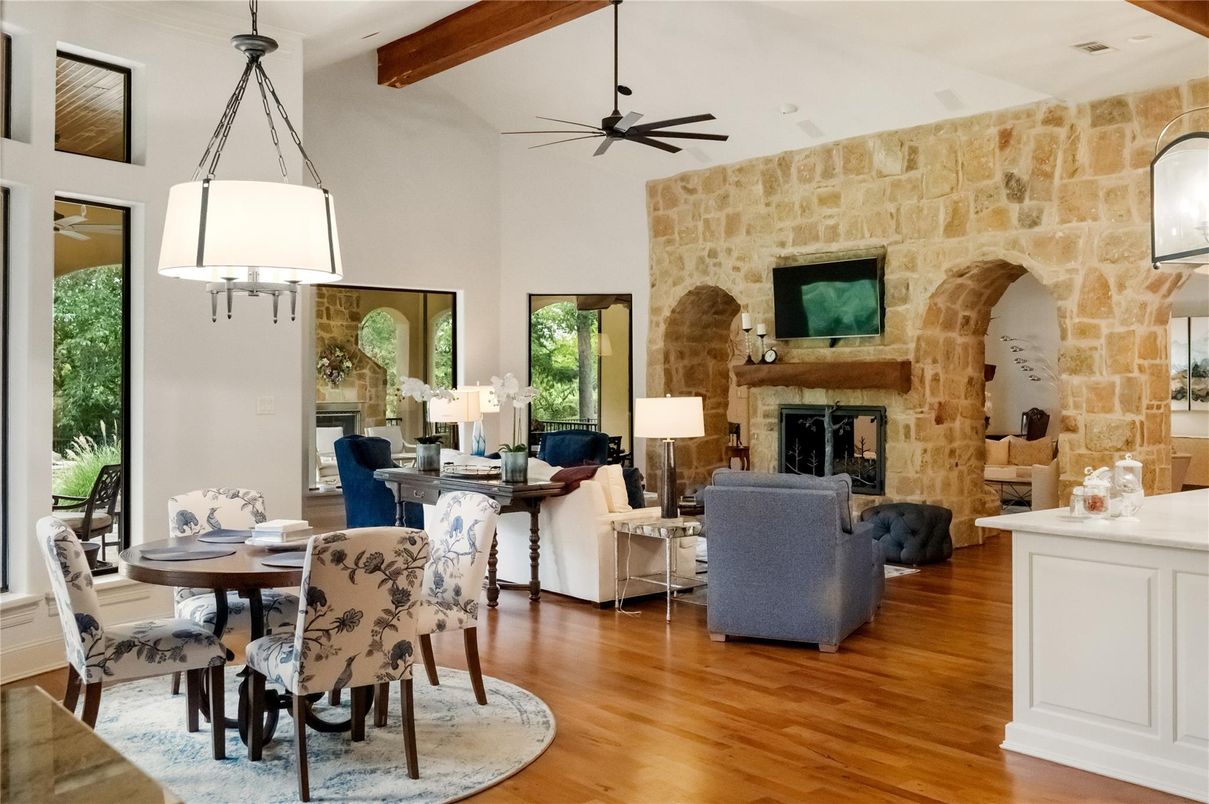 Dining room, Fireplace, Interior, Living room, Pendant Lights, Recessed Lighting, Stone Walls, Wooden Beams, Wood Texture Flooring