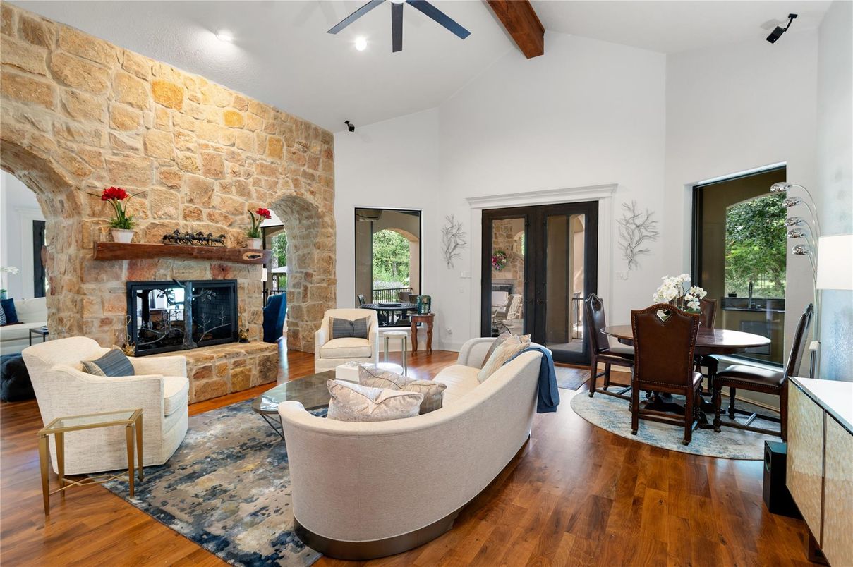 Dining room, Fireplace, Interior, Living room, Recessed Lighting, Stone Walls, Wooden Beams, Wood Texture Flooring
