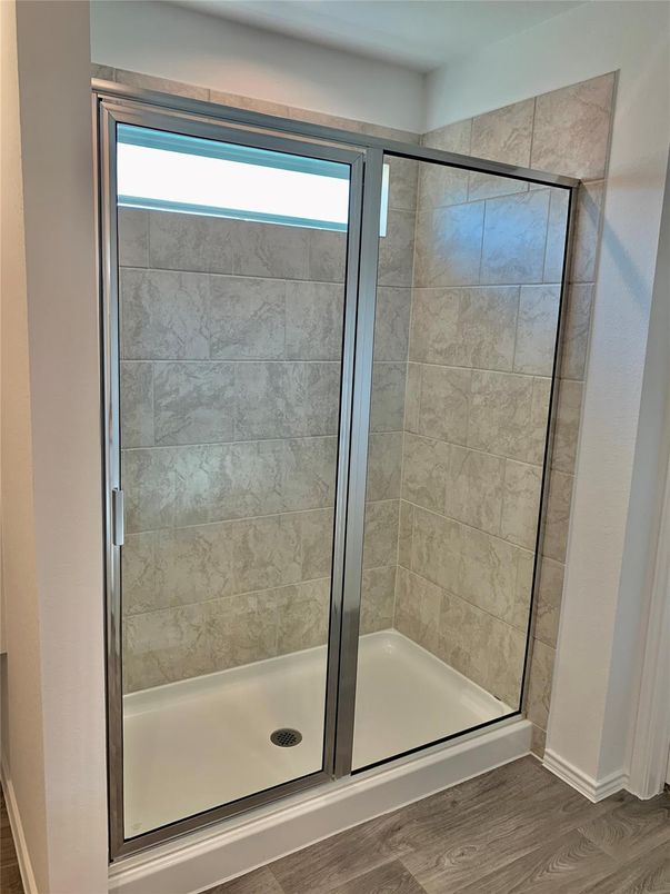 Bathroom, Glass Shower, Interior, Marble Walls, Wood Texture Flooring