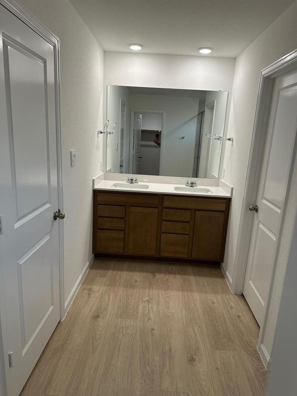 Bathroom, Dual Sink Vanities, Interior, Recessed Lighting, Wood Texture Flooring