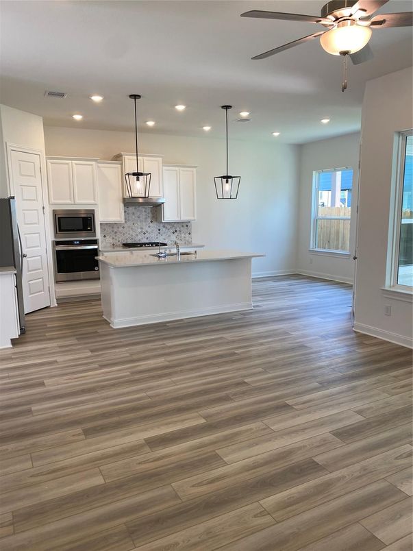 Interior, Kitchen, Pendant Lights, Recessed Lighting, Stainless Steel Appliances, Wood Texture Flooring