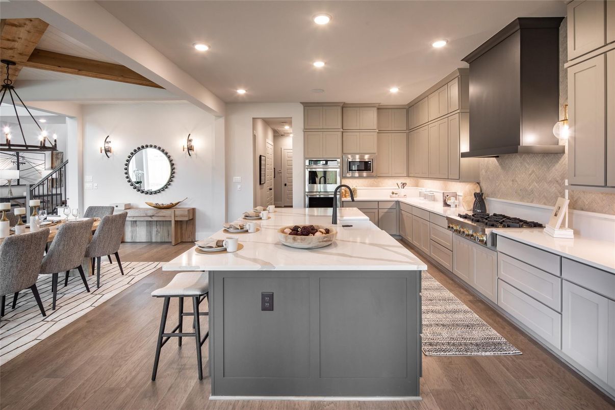 Dining room, Interior, Kitchen, Pendant Lights, Recessed Lighting, Stainless Steel Appliances, Wooden Beams, Wood Texture Flooring