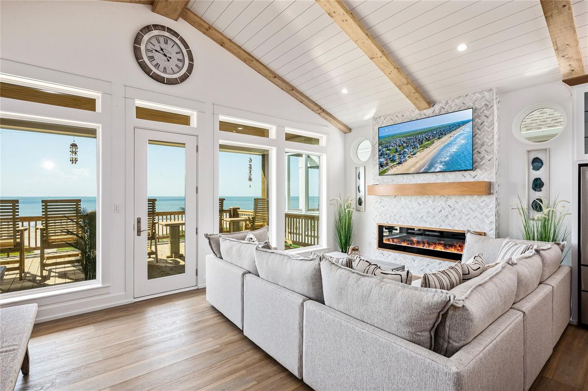 Fireplace, Interior, Living room, Recessed Lighting, Water, Wooden Beams, Wood Texture Flooring