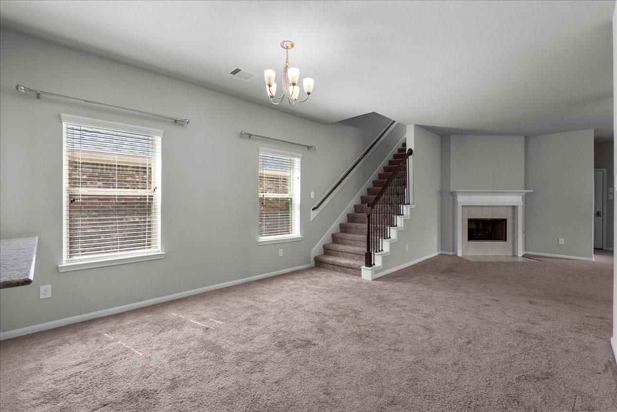 Chandelier, Empty room, Fireplace, Interior