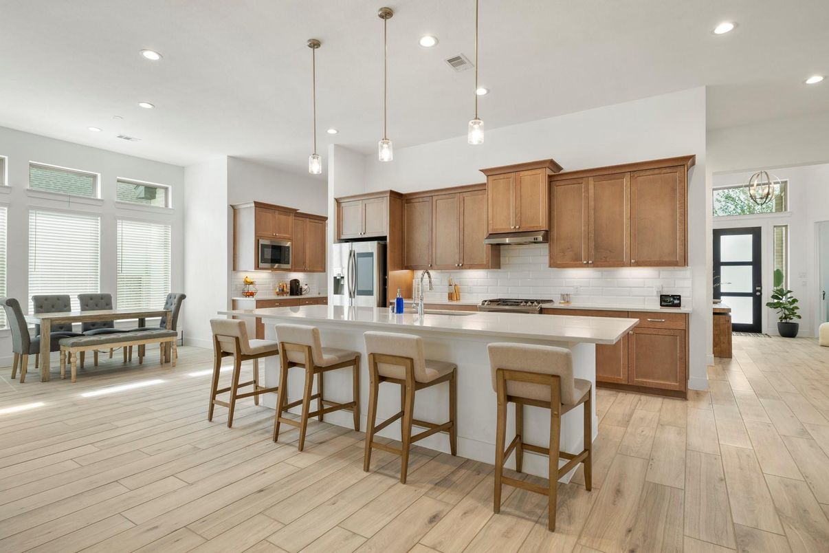 Dining room, Interior, Kitchen, Pendant Lights, Recessed Lighting, Stainless Steel Appliances, Wood Texture Flooring