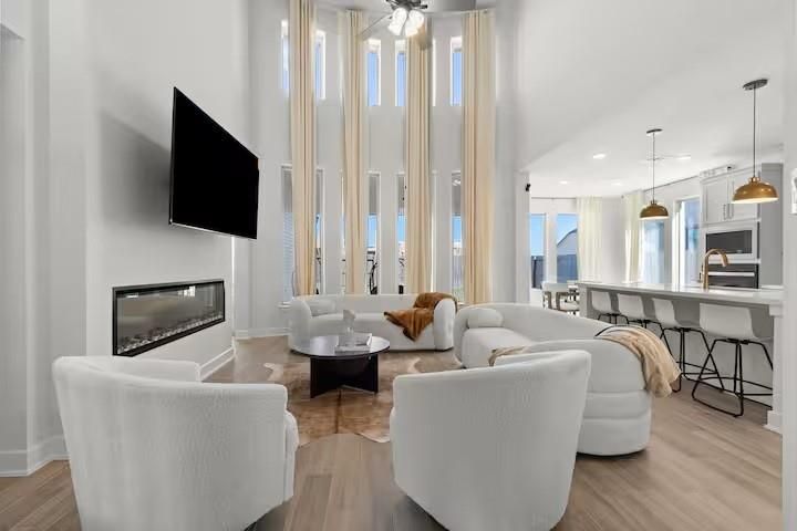 Fireplace, Interior, Kitchen, Living room, Pendant Lights, Recessed Lighting, Water, Wood Texture Flooring