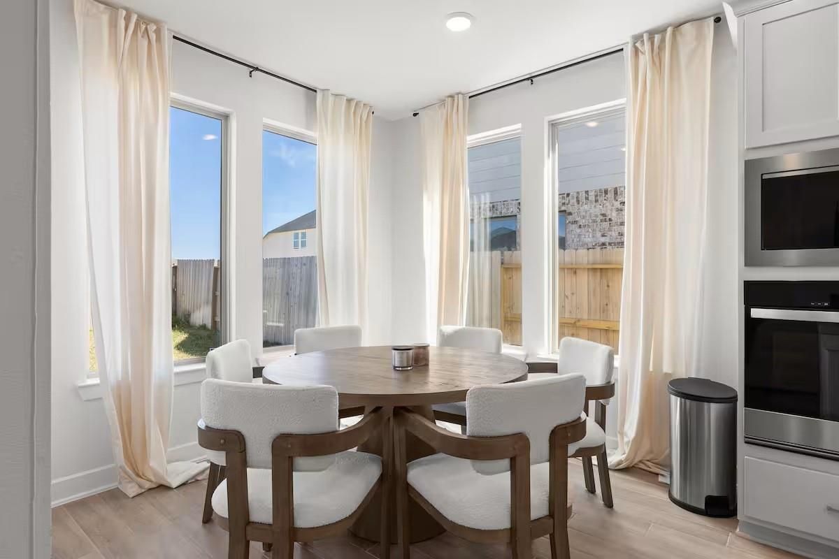 Dining room, Interior, Recessed Lighting, Stainless Steel Appliances, Wood Texture Flooring