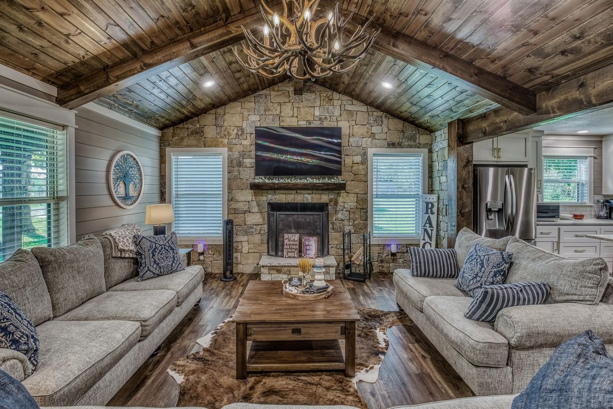 Chandelier, Fireplace, Interior, Kitchen, Living room, Recessed Lighting, Stone Walls, Wooden Beams, Wooden Ceilings, Wood Texture Flooring