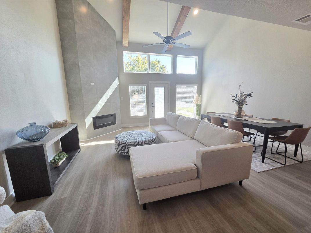 Dining room, Fireplace, Interior, Living room, Recessed Lighting, Wooden Beams, Wood Texture Flooring