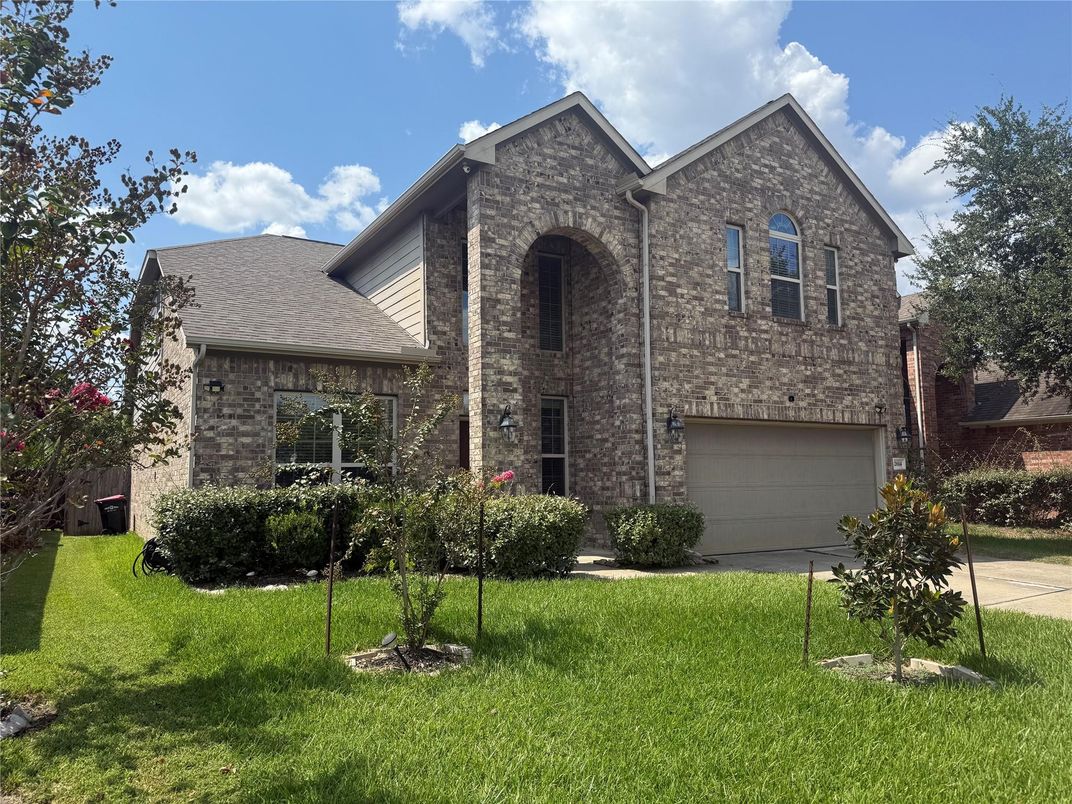 Attached, Exterior, Facade, Brick Facade, Brick Traditional