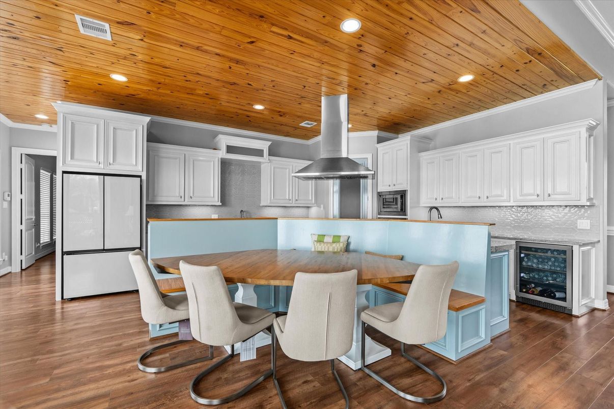 Dining room, Interior, Kitchen, Recessed Lighting, Stainless Steel Appliances, Wooden Ceilings, Wood Texture Flooring