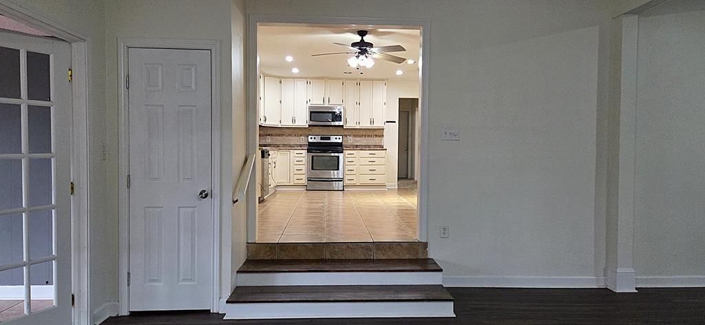 Interior, Kitchen, Recessed Lighting, Stainless Steel Appliances, Wood Texture Flooring