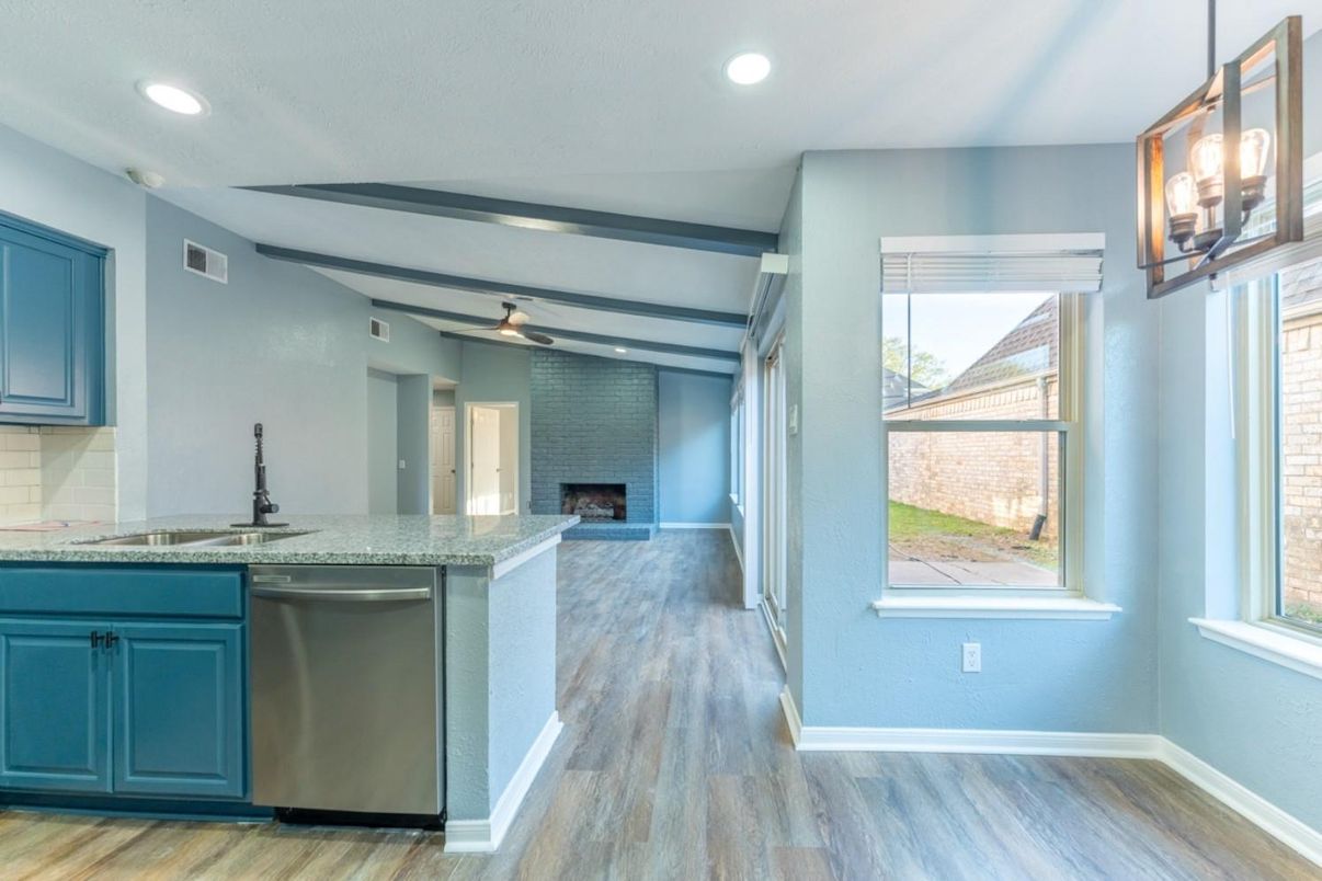 Fireplace, Interior, Kitchen, Recessed Lighting, Stone Walls, Wood Texture Flooring