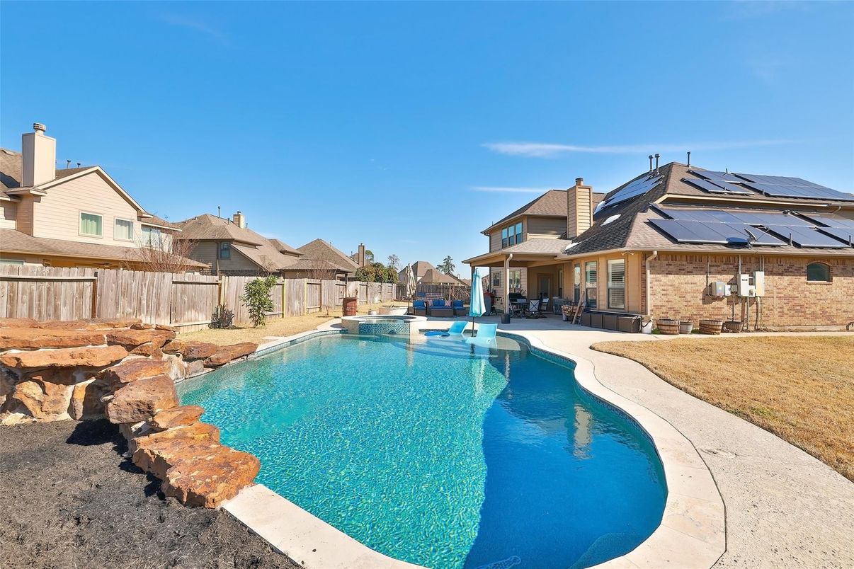 Exterior, Pool, Solar Panels