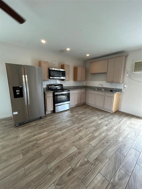 Interior, Kitchen, Recessed Lighting, Stainless Steel Appliances, Wood Texture Flooring
