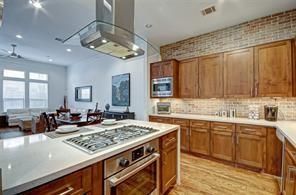 Dining room, Interior, Kitchen, Recessed Lighting, Stainless Steel Appliances, Wood Texture Flooring