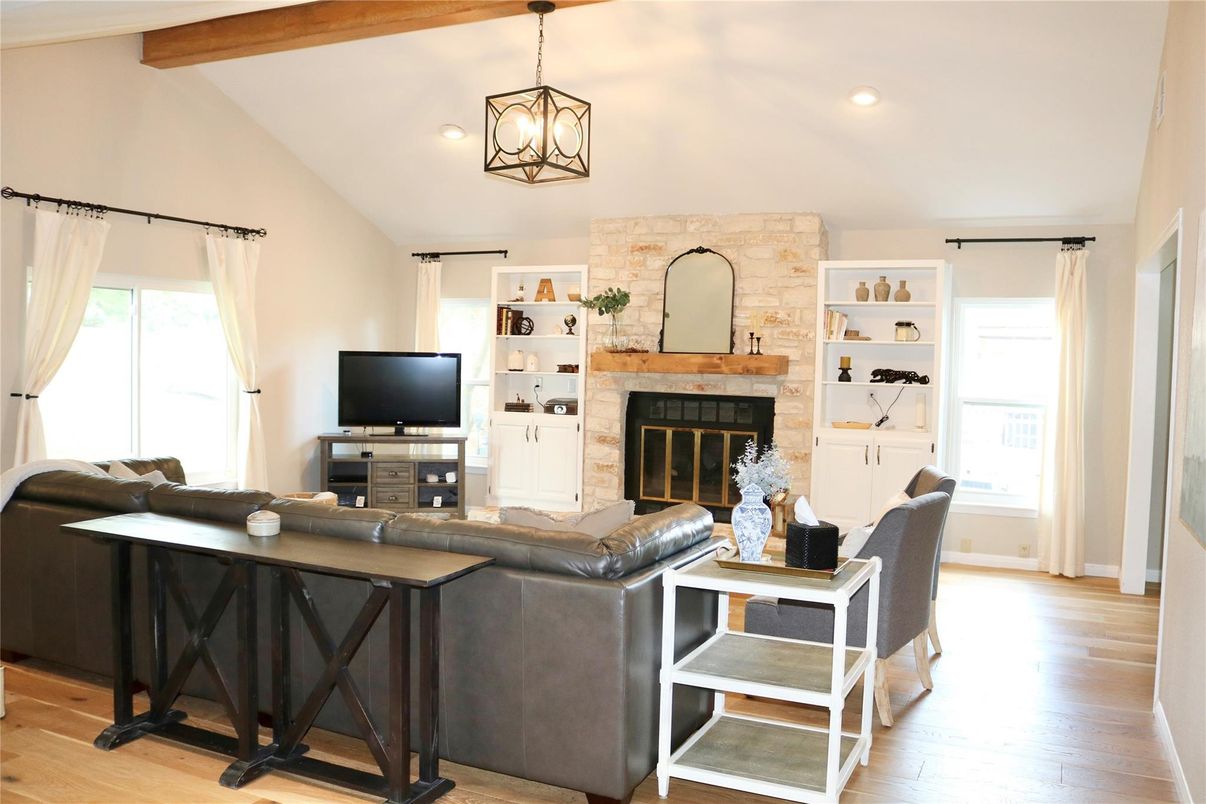 Fireplace, Interior, Living room, Pendant Lights, Recessed Lighting, Stone Walls, Wooden Beams, Wood Texture Flooring