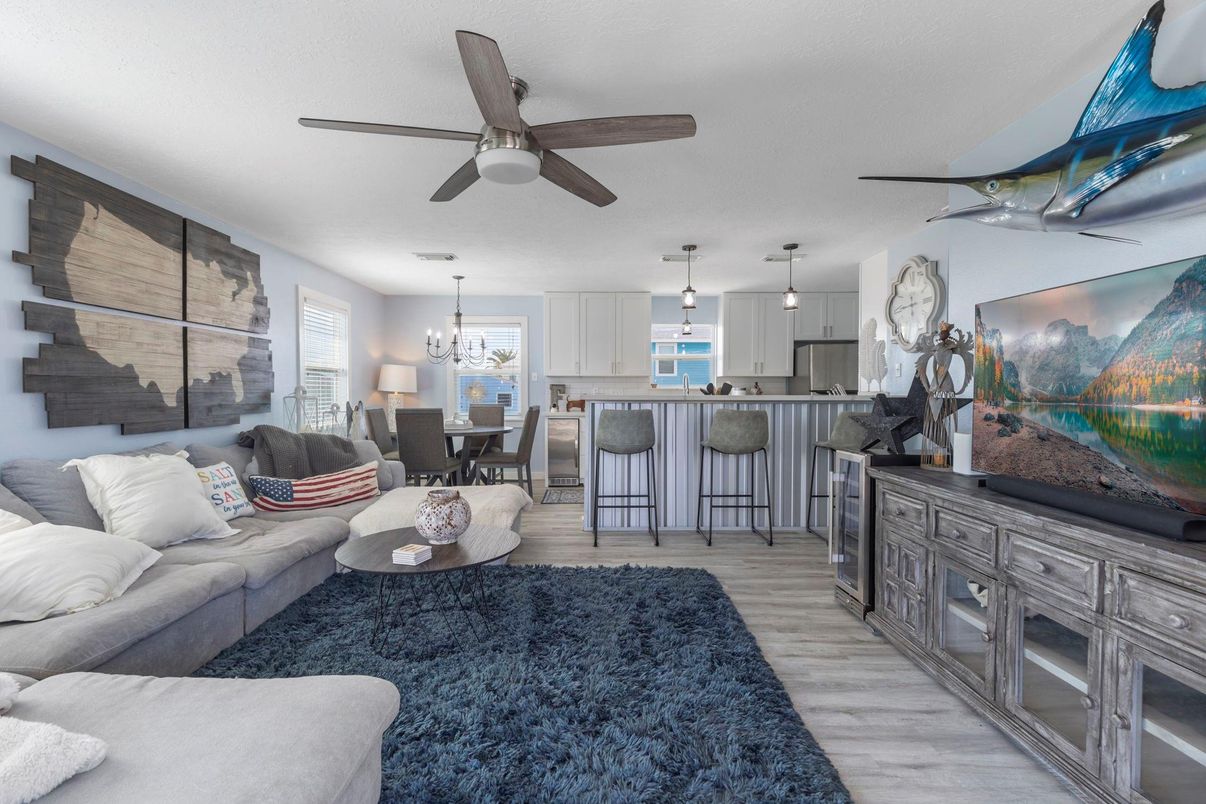 Chandelier, Dining room, Interior, Kitchen, Living room, Pendant Lights, Stainless Steel Appliances, Wood Texture Flooring