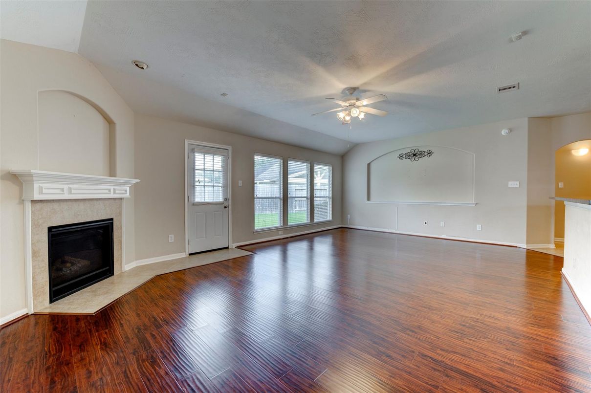 Empty room, Fireplace, Interior, Recessed Lighting, Wood Texture Flooring