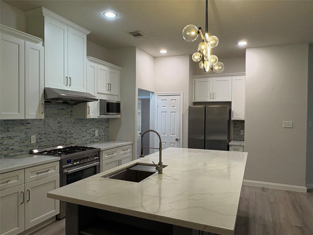 Interior, Kitchen, Pendant Lights, Recessed Lighting, Stainless Steel Appliances, Wood Texture Flooring