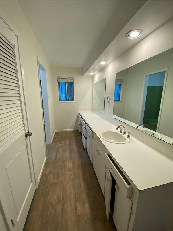 Bathroom, Dual Sink Vanities, Interior, Recessed Lighting, Wood Texture Flooring