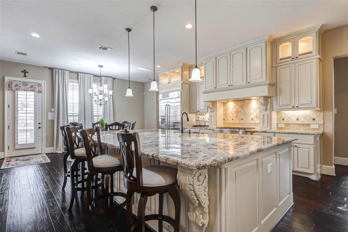 Dining room, Interior, Kitchen, Pendant Lights, Recessed Lighting, Stainless Steel Appliances, Wood Texture Flooring