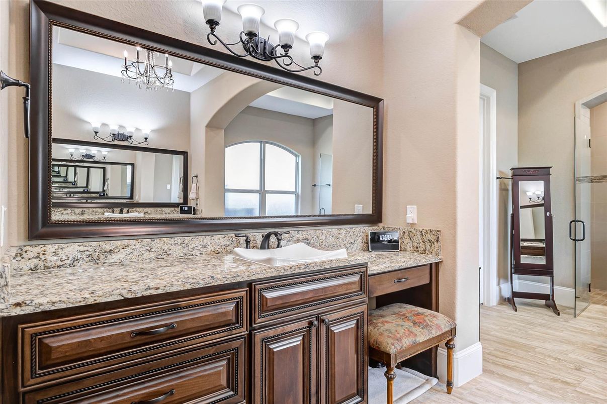 Bathroom, Chandelier, Dual Sink Vanities, Interior, Wood Texture Flooring