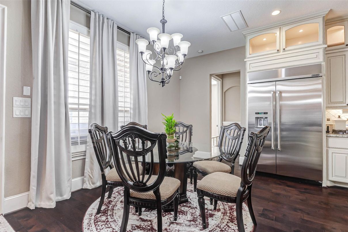 Chandelier, Dining room, Interior, Kitchen, Recessed Lighting, Stainless Steel Appliances, Wood Texture Flooring