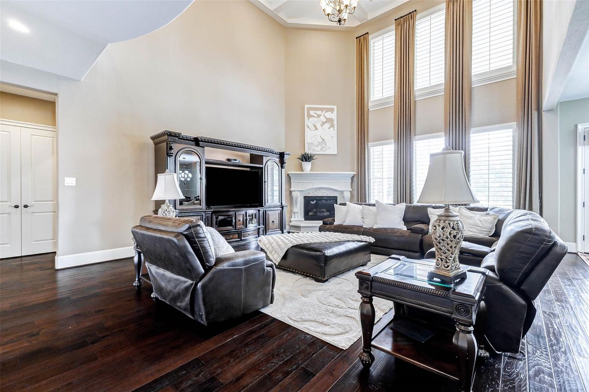 Chandelier, Fireplace, Interior, Living room, Recessed Lighting, Wood Texture Flooring