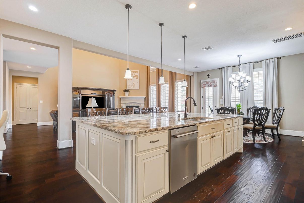 Chandelier, Dining room, Interior, Kitchen, Pendant Lights, Recessed Lighting, Stainless Steel Appliances, Wood Texture Flooring