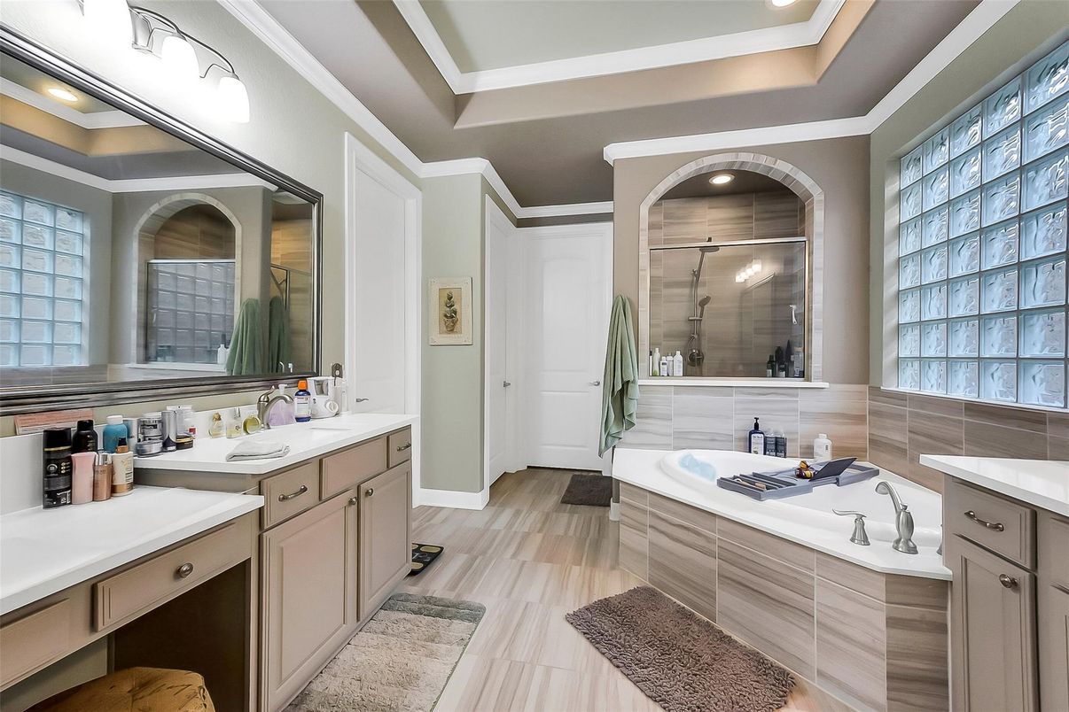 Bathroom, Dual Sink Vanities, Glass Shower, Interior, Recessed Lighting, Wood Texture Flooring