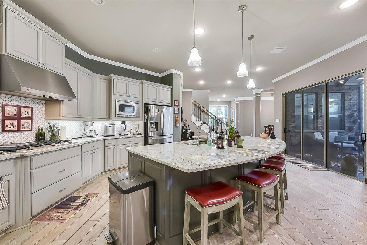 Interior, Kitchen, Pendant Lights, Recessed Lighting, Stainless Steel Appliances, Wood Texture Flooring