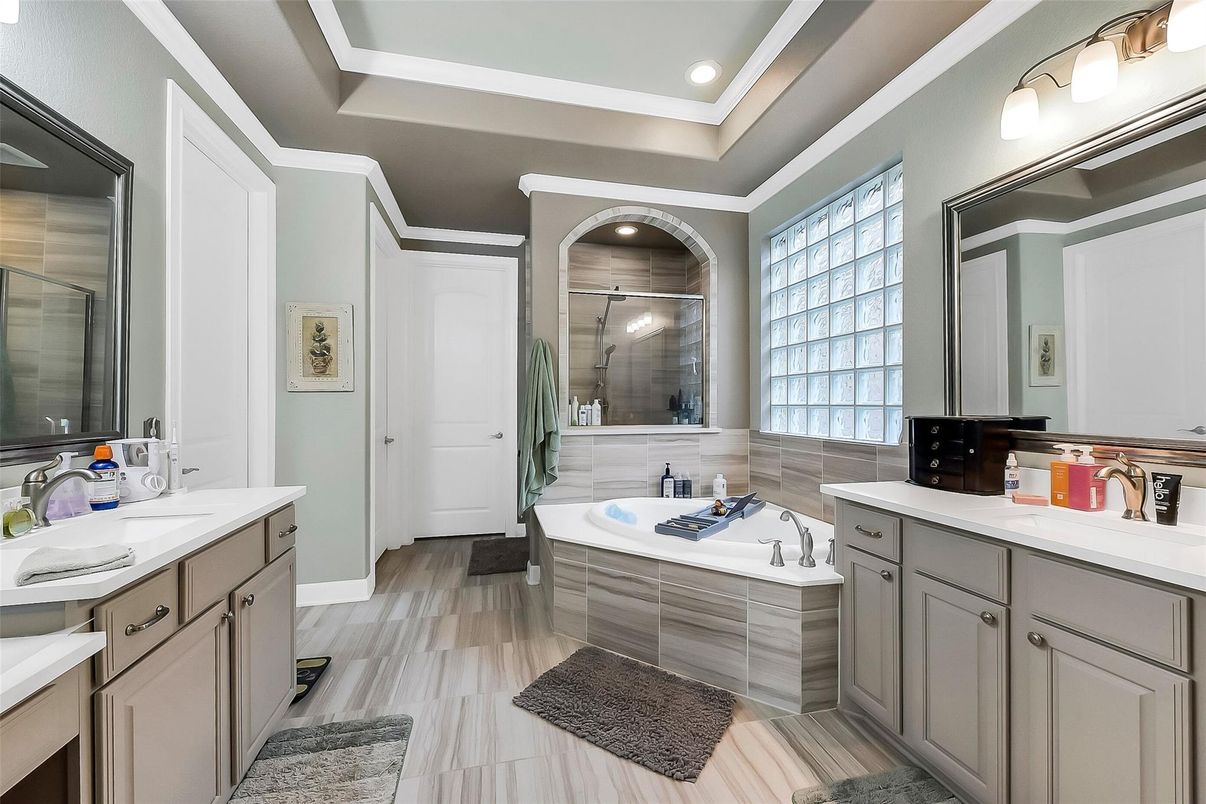 Bathroom, Dual Sink Vanities, Glass Shower, Interior, Recessed Lighting, Wood Texture Flooring