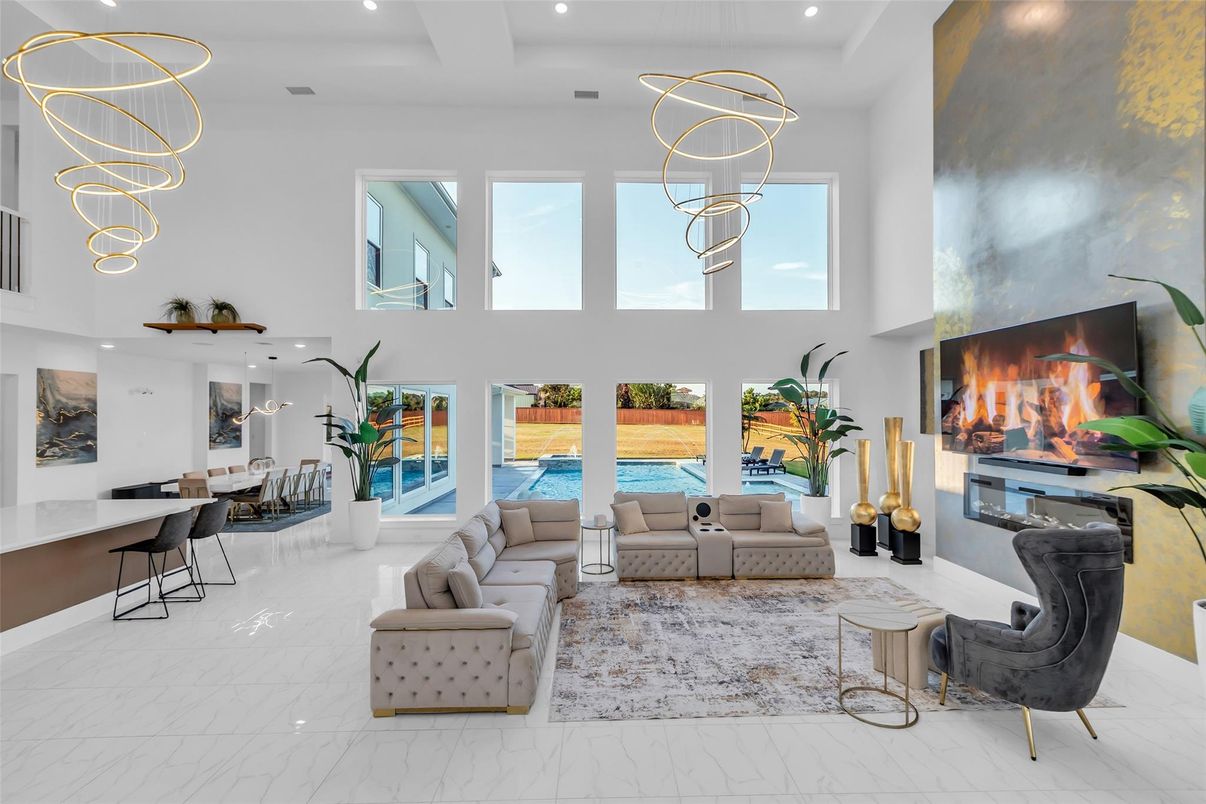 Dining room, Fireplace, Interior, Living room, Marble, Pendant Lights, Recessed Lighting, Water