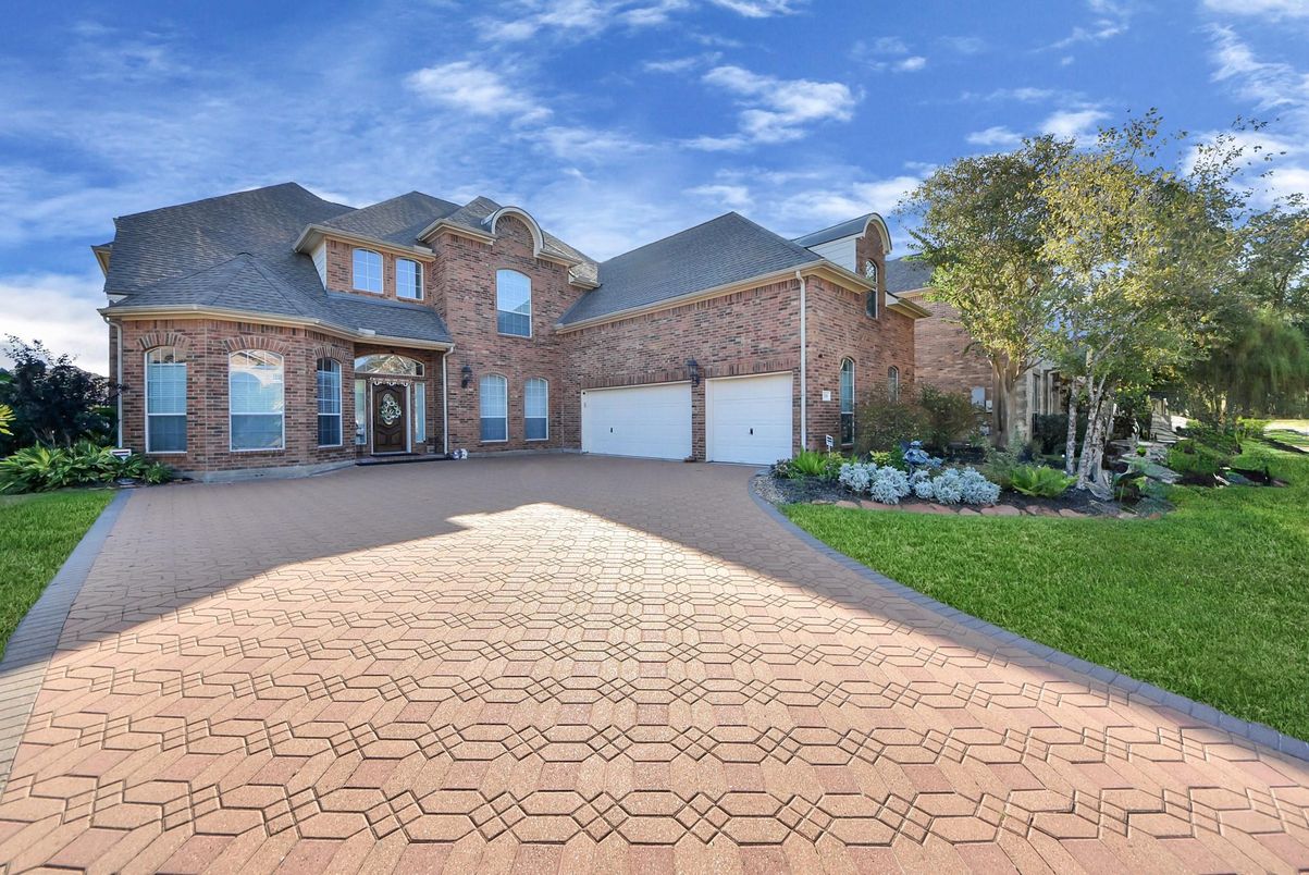 Attached, Exterior, Facade, Brick Facade, French Provincial