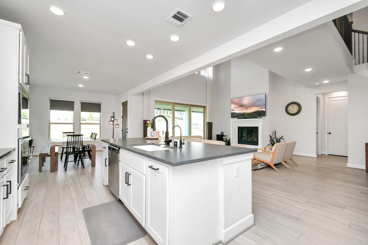 Dining room, Fireplace, Interior, Kitchen, Recessed Lighting, Wood Texture Flooring