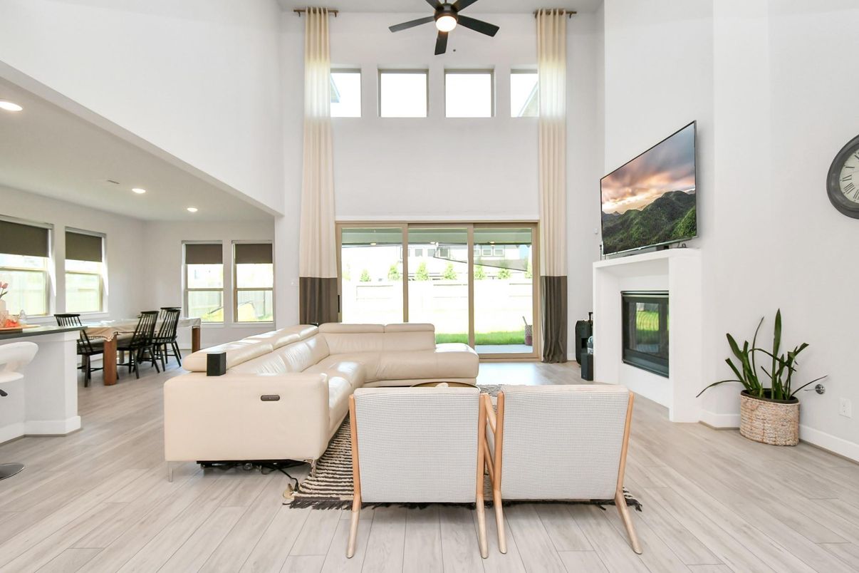 Dining room, Fireplace, Interior, Living room, Pendant Lights, Recessed Lighting, Wood Texture Flooring