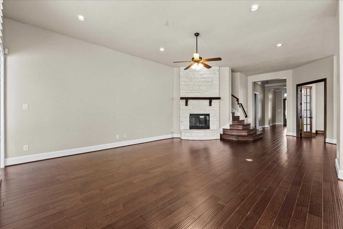 Empty room, Fireplace, Interior, Recessed Lighting, Wood Texture Flooring