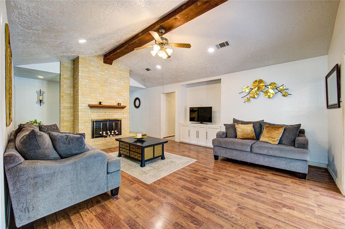 Fireplace, Interior, Living room, Recessed Lighting, Stone Walls, Wooden Beams, Wood Texture Flooring