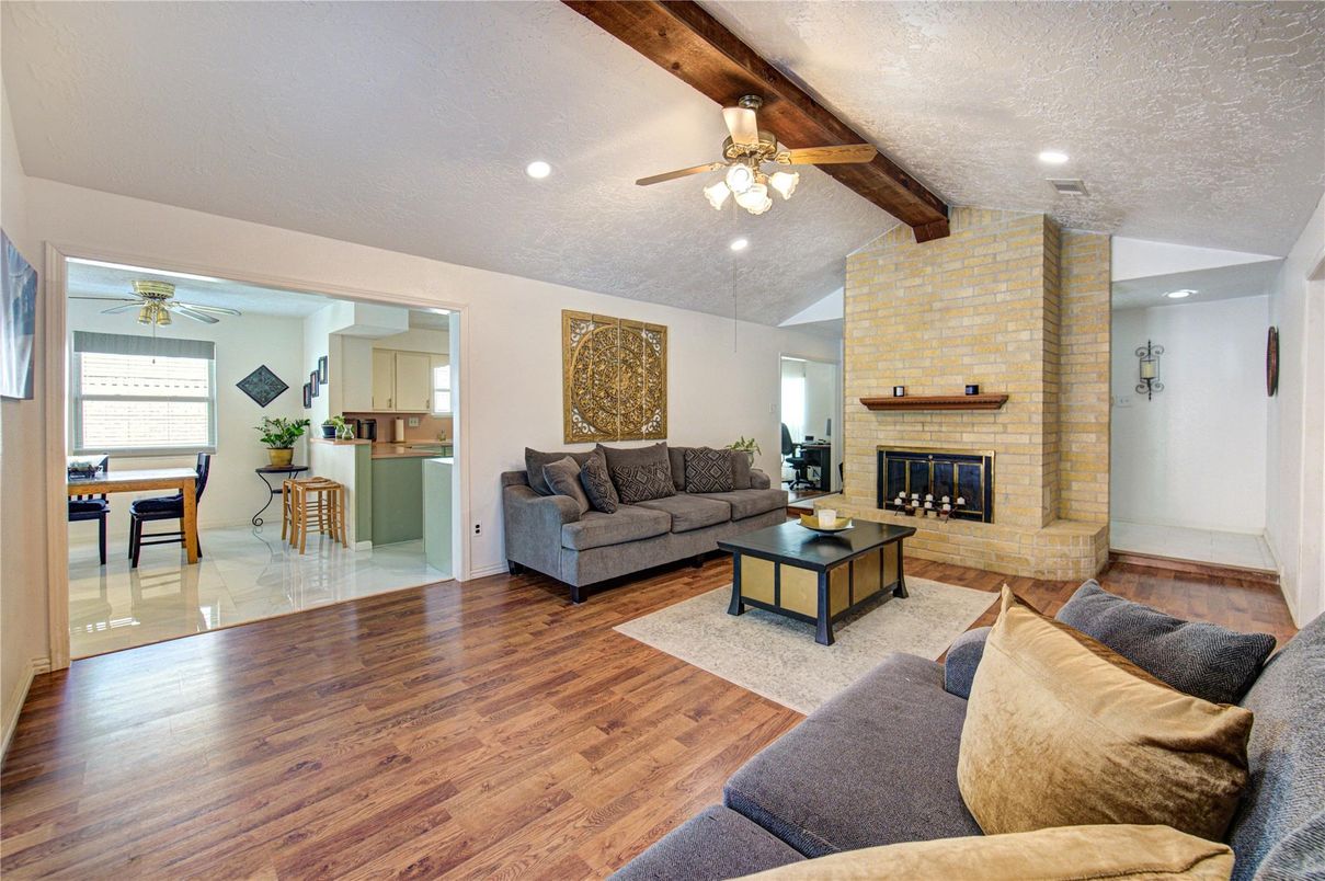 Fireplace, Interior, Living room, Recessed Lighting, Stone Walls, Wooden Beams, Wood Texture Flooring