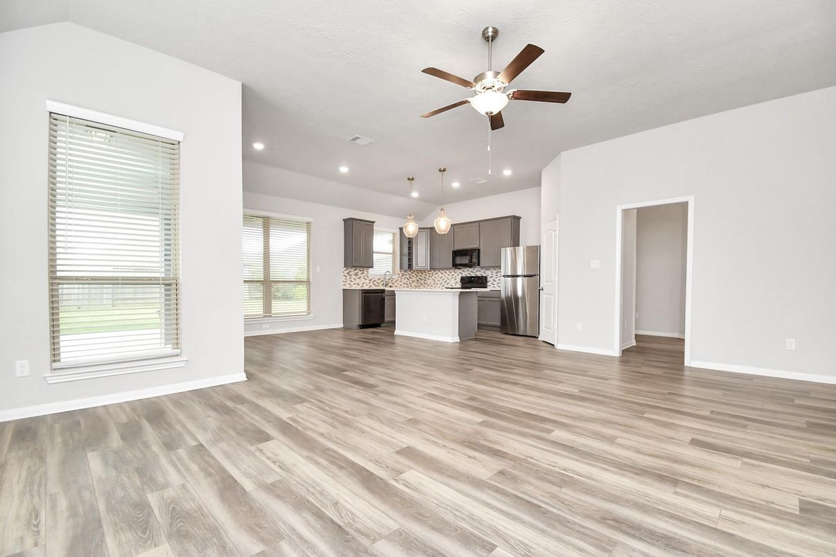 Empty room, Interior, Kitchen, Pendant Lights, Recessed Lighting, Stainless Steel Appliances, Wood Texture Flooring