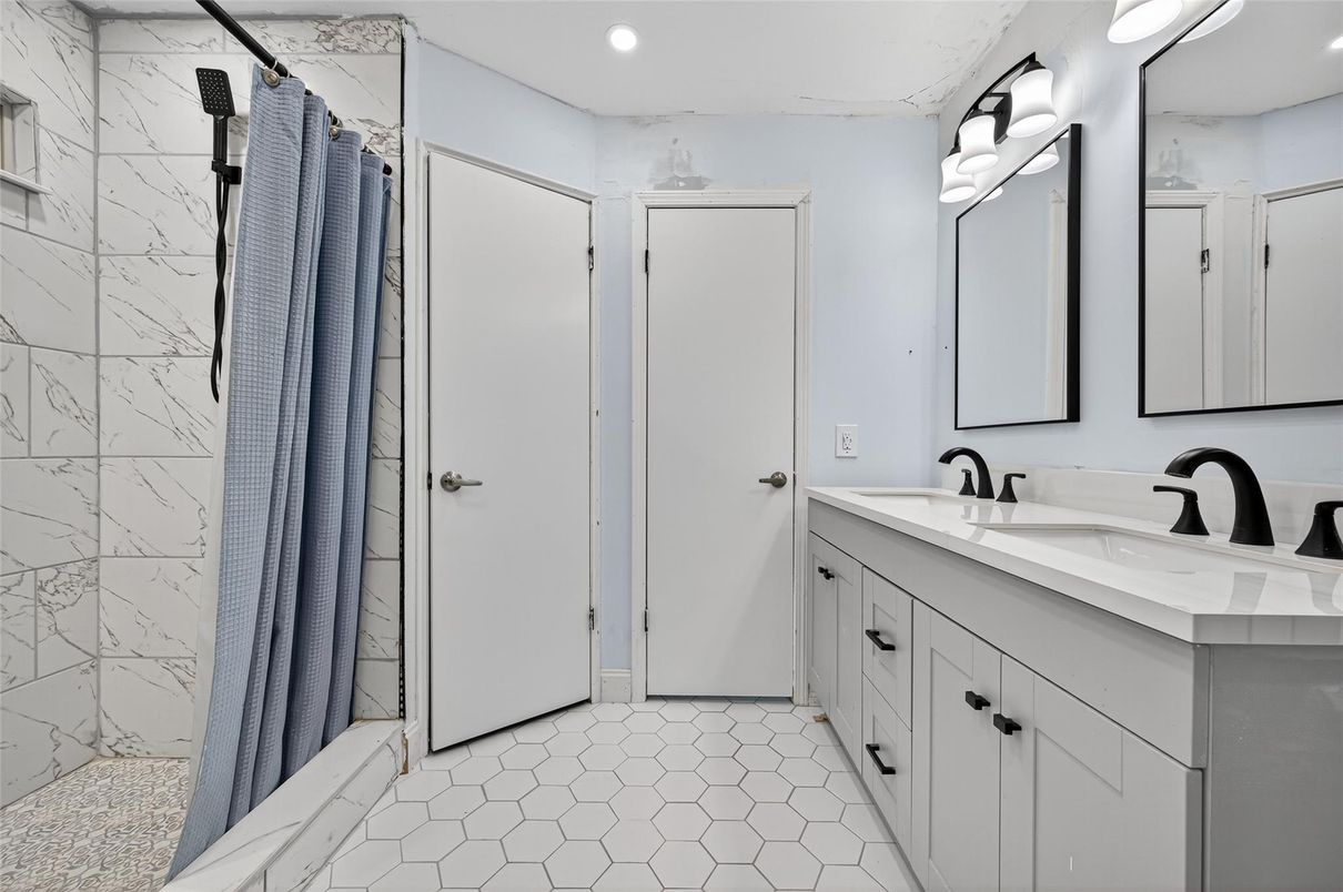 Bathroom, Dual Sink Vanities, Interior, Marble Walls, Recessed Lighting